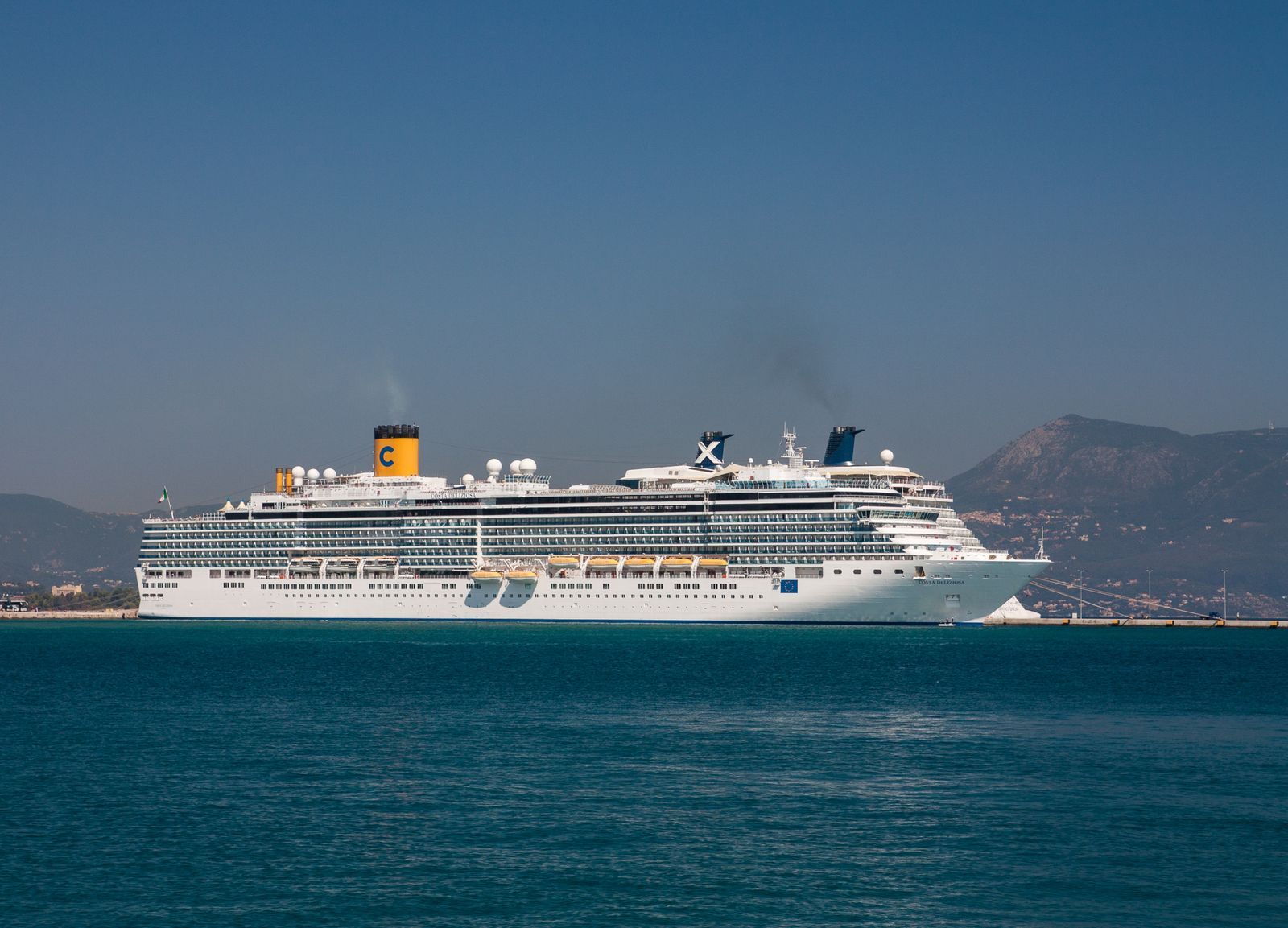 A cruise ship sailing off the coast of Corfu, Greece, a reminder that older cruise ships sail the same waters as the newest